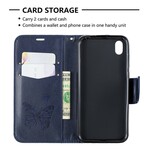 Huawei P30 Asia perhoset ja vino läppä