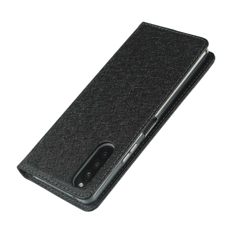 Flip Cover Sony Xperia 10 II Pehmeä nahkatyylinen suojus, jossa on hihna